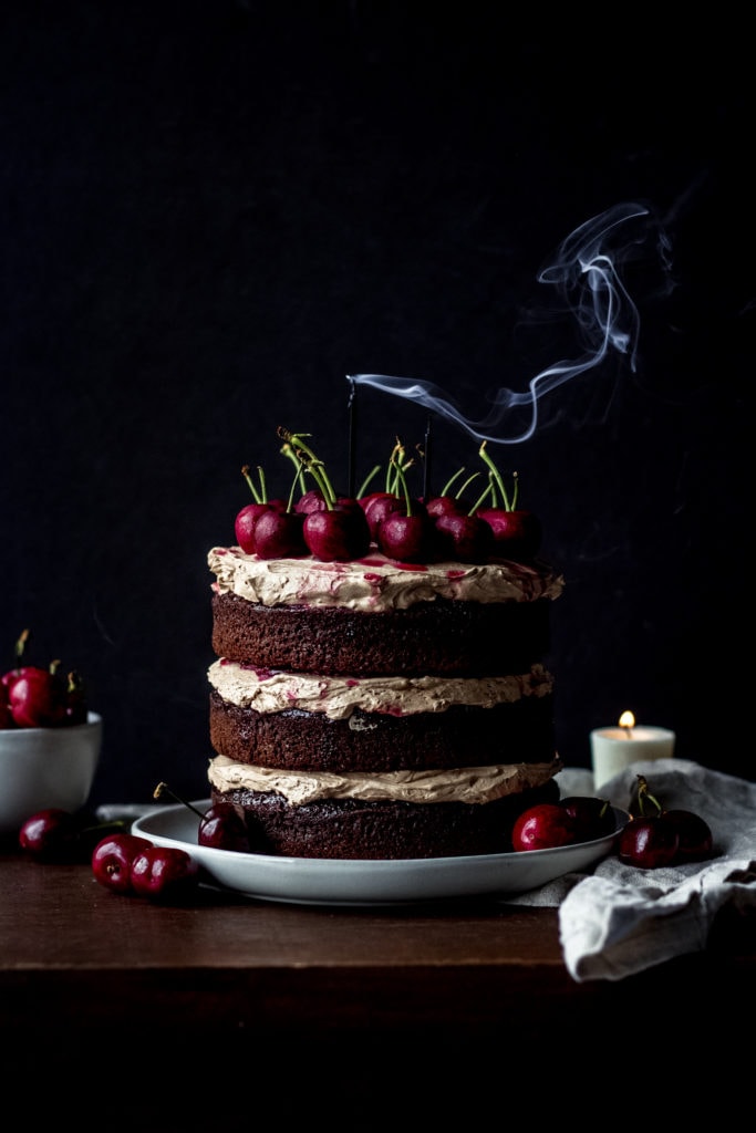 Candle burning Chocolate cake with chocolate diplomat cream