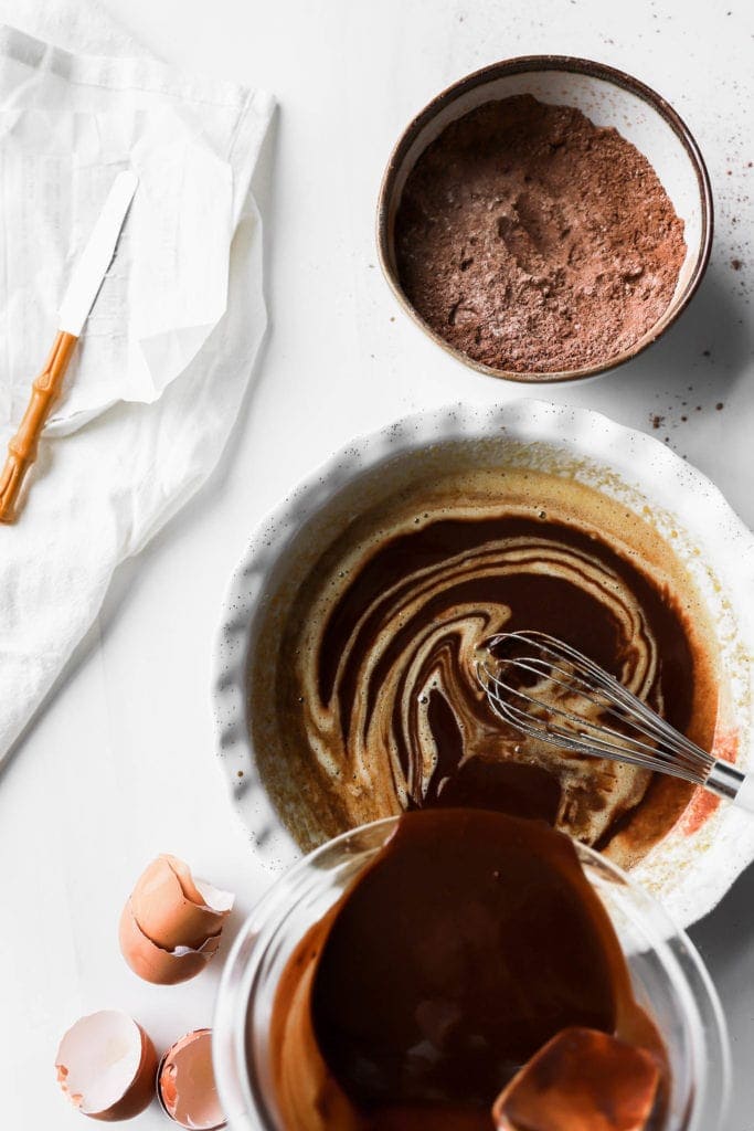 slowly whisk in chocolate and butter to sugar and eggs